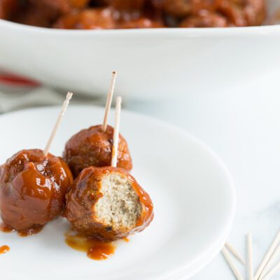 BBQ Glazed Bourbon Meatballs ona white plate
