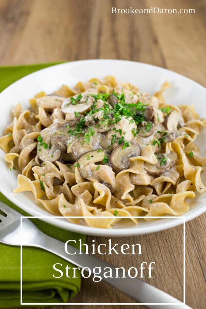 Chicken stroganoff with mushrooms in white bowl
