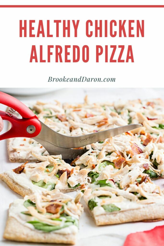 Pizza being cut with pizza shears