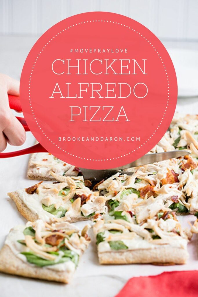 Pizza being cut with pizza shears