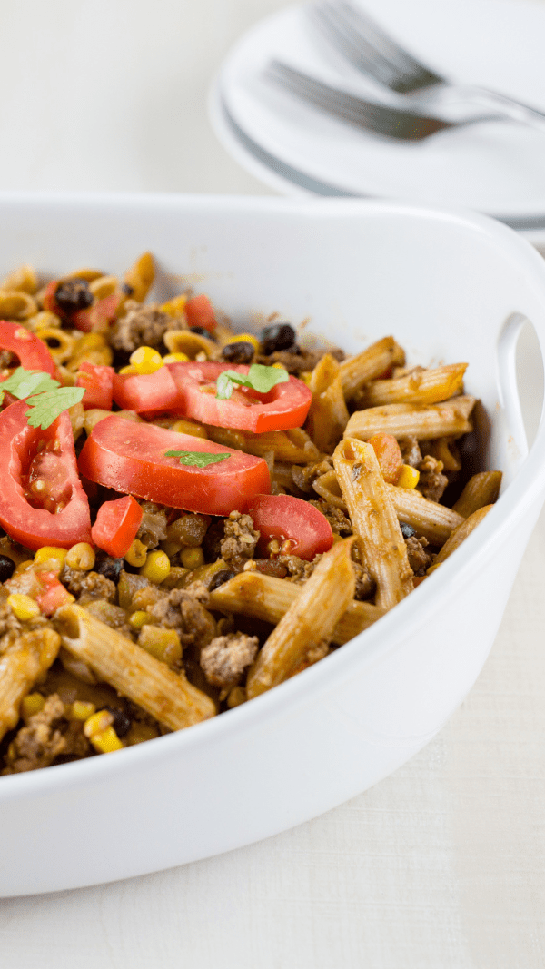 Close-Up picture of tex mex casserole on a red and white chevron cloth