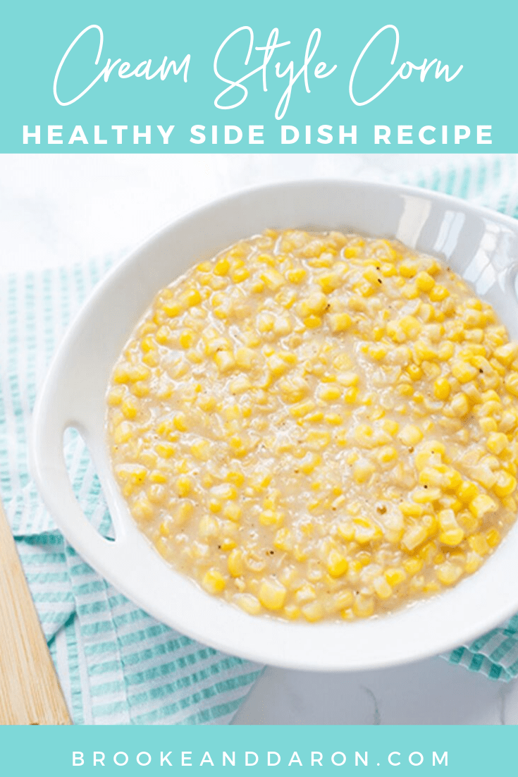 Large bowl of cream corn sitting on white and blue checked cloth