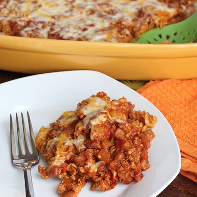 Overhead picture of a white plate filled with chili mac casserole recipe
