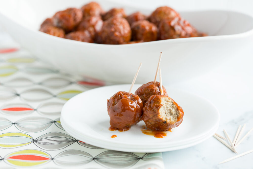 Overhead picture of bowls of bourbon meatballs