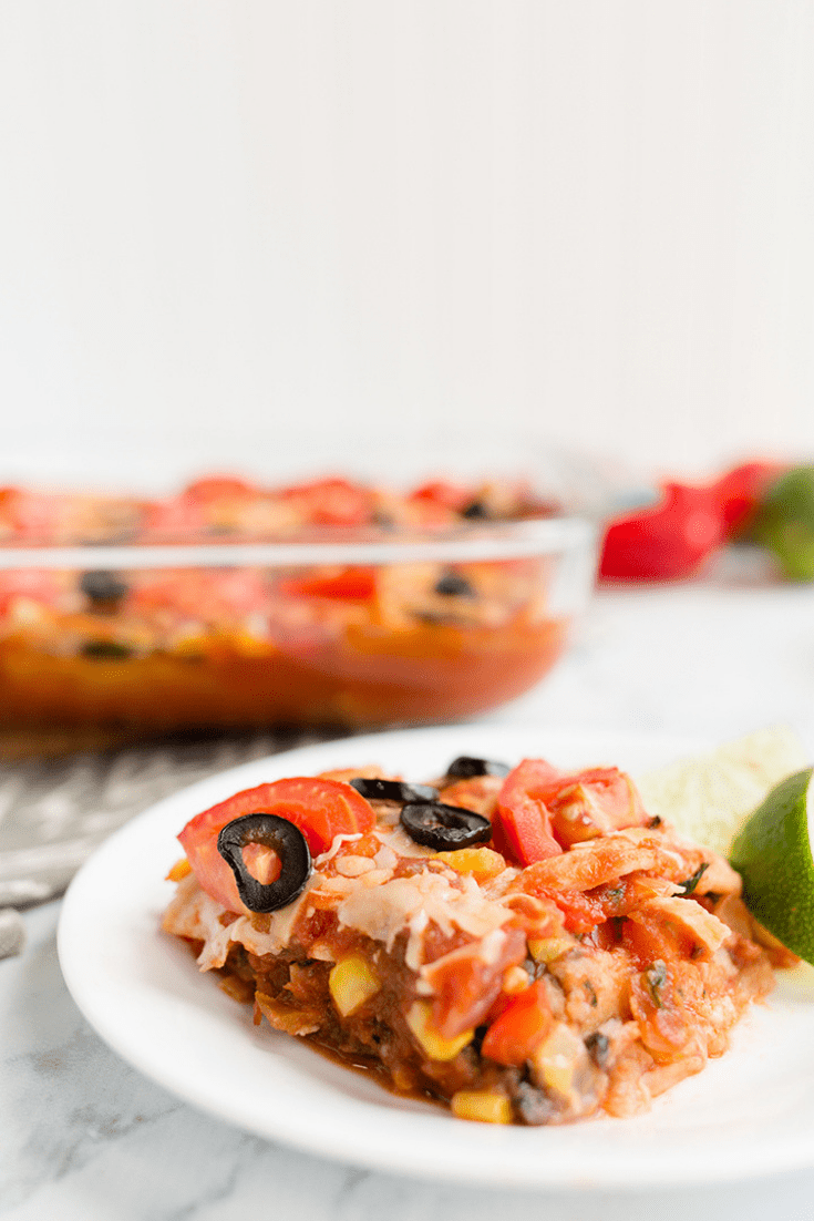 Single serving of mexican enchilada lasagna recipe on a white plate