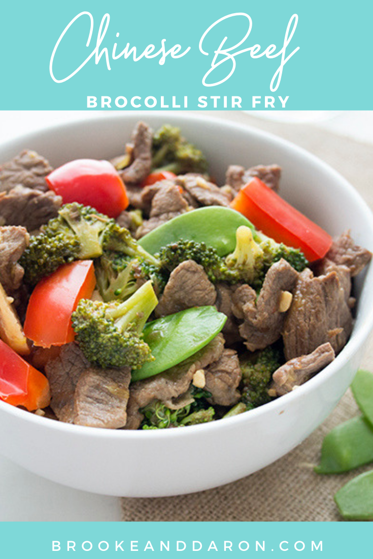 Up close picture of a chinese beef stir fry in a large white bowl