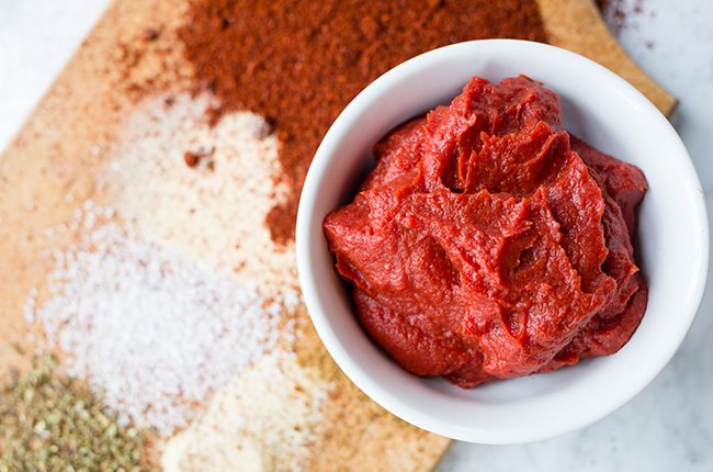Up close picture of the sauce and spices for enchilada sauce