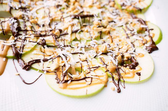 Up close apple nacho with peanut butter