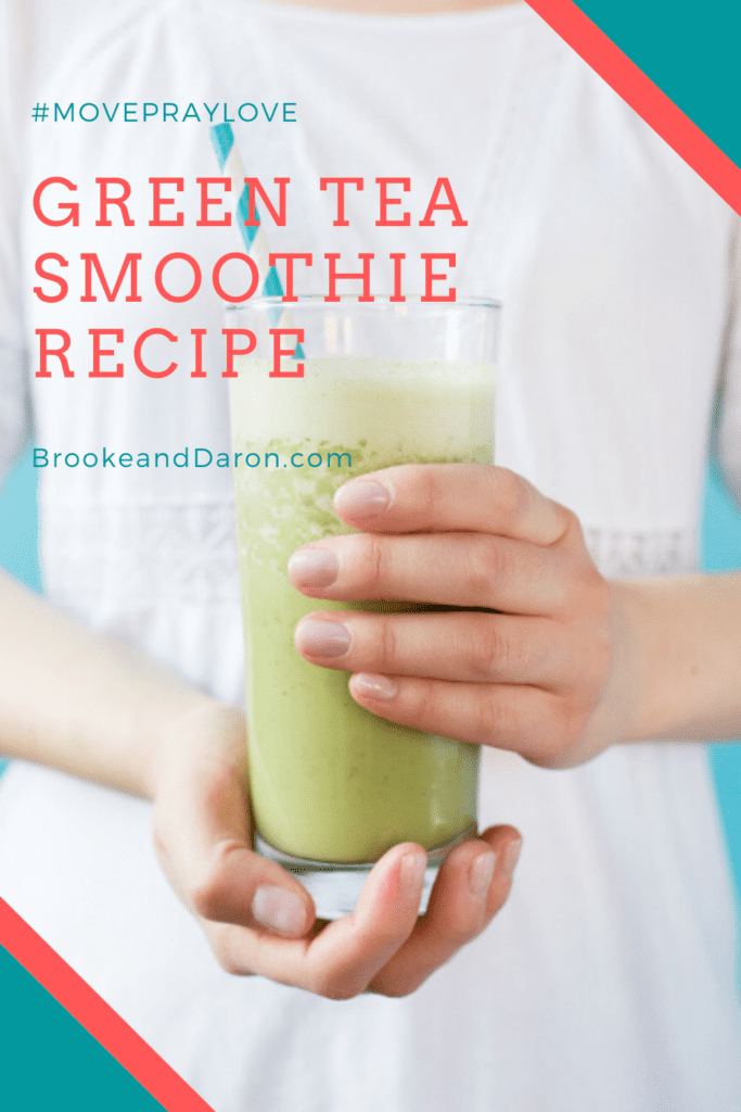 Woman in white dress holding green smoothie