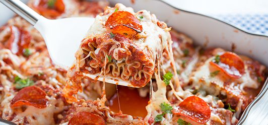Baking dish with roll ups on spatula