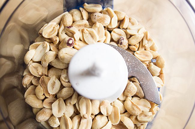 Breaking up the peanuts before coating the Chipotle Barbecue Peanut Chicken Tenders