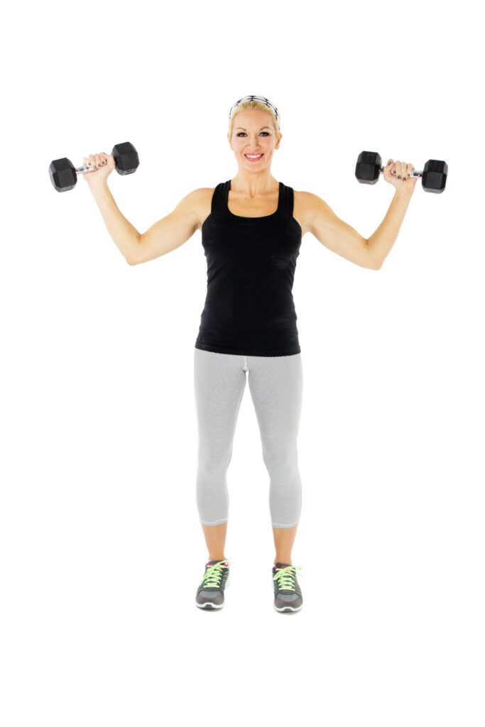 image of brooke doing a shoulder press for dumbbell arm workout routine