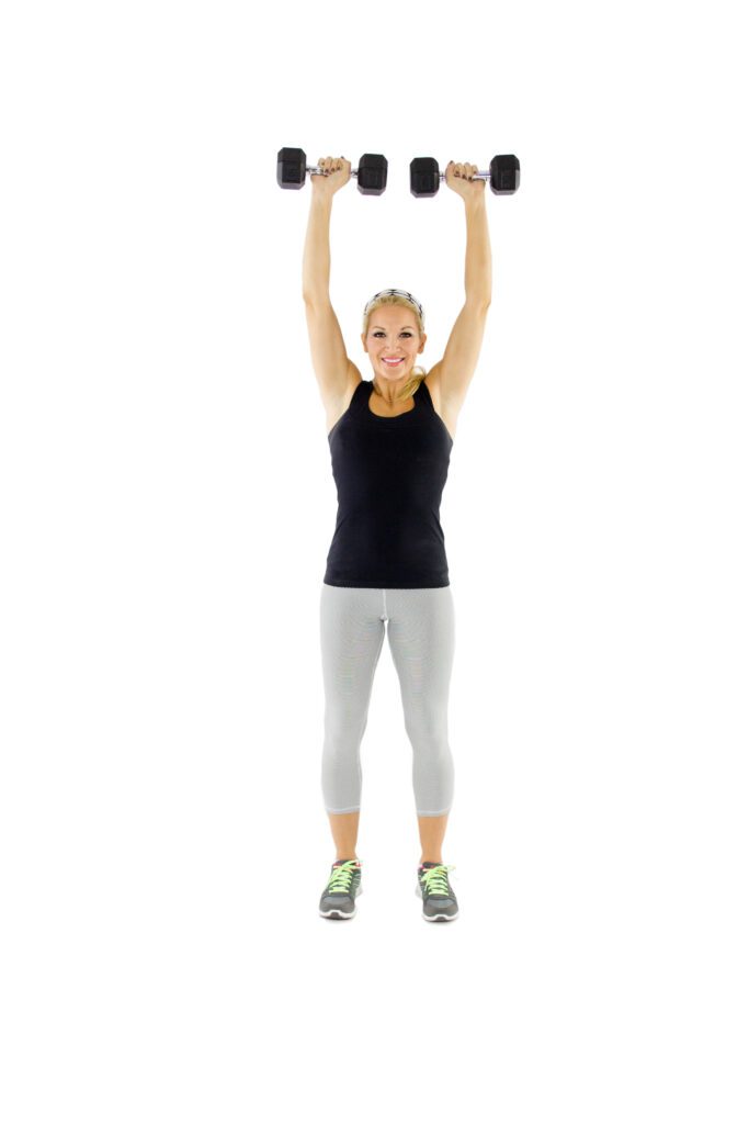 image of Brooke doing a shoulder press with dumbbells