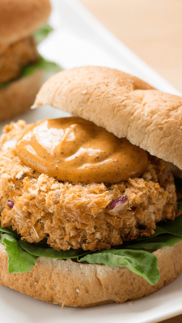 Plated Salmon Burgers with sauce and bun